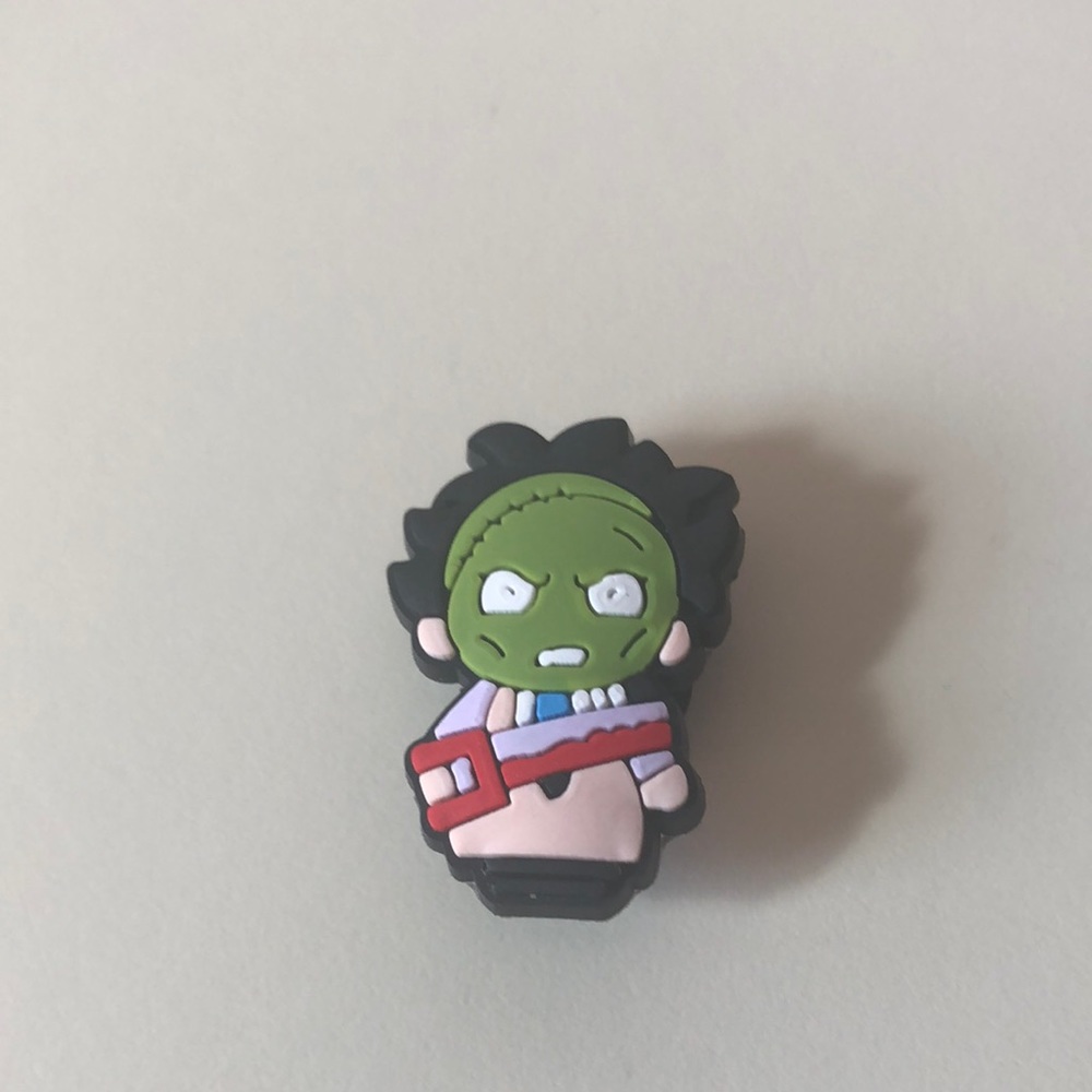 Leather face croc charm